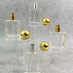 Atomizador cuadrado recargable de 30 ml y 50 ml, frasco de perfume de vidrio transparente con pulverizador dorado o plateado, frascos de perfume vacíos.