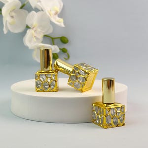 10ml Luxus Gold quadratische Sprühflasche, leere Goldzerstäuberfläschchen, nachfüllbares Parfümglas, Mini-Reiseduftflasche, Flasche für ätherisches Öl