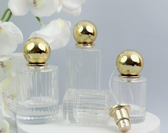 Frasco de perfume em vidro transparente com textura canelada, atomizador recarregável de 30ml, 50ml e 100ml com tampa dourada, embalagem vazia para frasco de spray de fragrância.