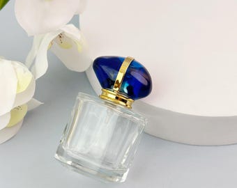 Frasco de perfume em vidro transparente de 30ml com spray, frasco recarregável de névoa fina com tampa azul com detalhe de gema, embalagem vazia para viagem, frasco spray para presente.