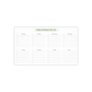 Könnte beinhalten: Ein weißer Wochenplaner mit einem grünen Aquarellakzent oben. Der Planer ist in Abschnitte für jeden Wochentag unterteilt, mit Platz für Notizen. Der Text "THIS WEEK'S PLAN" steht oben.