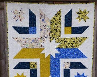Green and blue star lap or wall quilt.