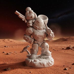 May include: A detailed, light gray figurine of a futuristic warrior in armor, carrying a weapon and a smaller character on its back. The figurine is set against a Martian landscape with a red-orange ground and a starry sky.