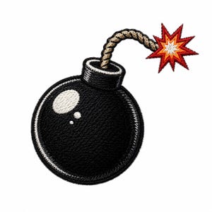 May include: An embroidered patch featuring a round black bomb with a white highlight on its side. A tan rope fuse extends from the top, ending in a red, orange, and white star-shaped explosion. The design is rendered in dense thread stitching.