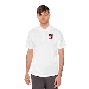 May include: A white short-sleeved polo shirt featuring a small rectangular logo on the left chest. The logo contains a red square with a white lowercase letter g and an exclamation point, with the text good guys printed in black underneath.