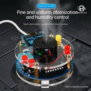 May include: Electronic DIY kit with a clear acrylic top, a black cylindrical component, and a small digital display showing humidity and time. The kit includes red and yellow buttons and is labeled with the text "Fine and uniform atomization and humidity control."