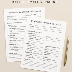 May include: Two white Hormone Lab Tracker sheets, one labeled "FEMALE" and the other "MALE", with sections for hormone panel results and other health information. A gold pen rests on the right side.