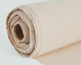 May include: A roll of natural-colored canvas fabric. The fabric is tightly rolled, revealing layers of the material. The edges of the roll are neatly aligned, and the fabric appears to be a medium weight, suitable for various crafting and sewing projects.