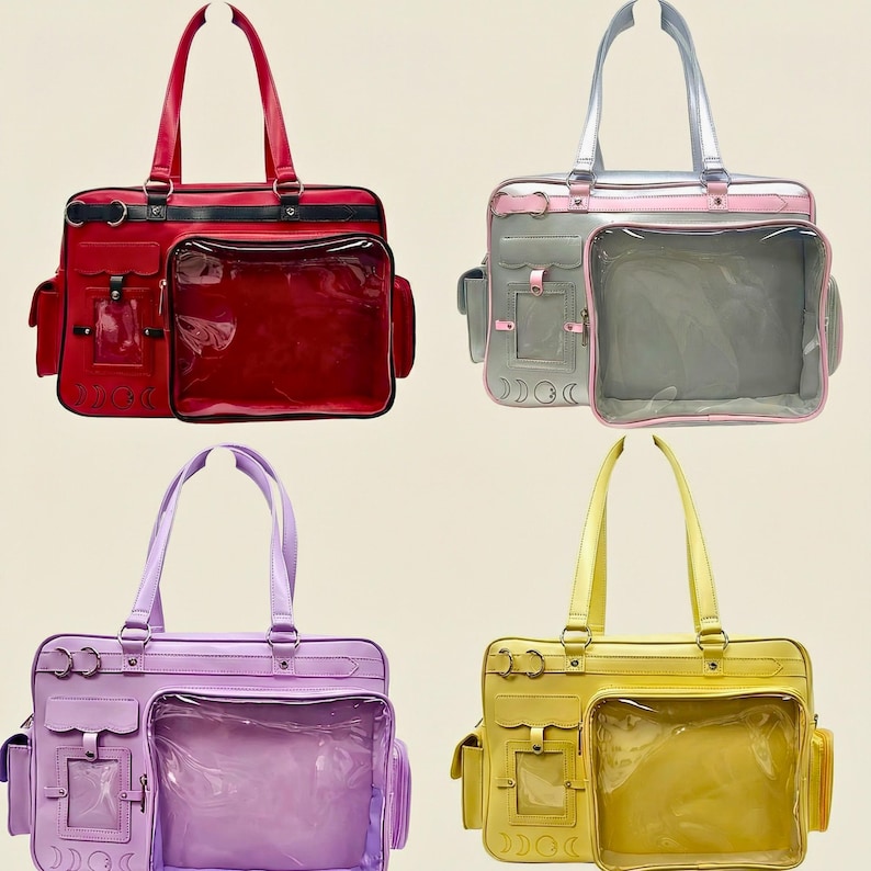 May include: Four colourful tote bags with handles. Each bag has a large, clear front pocket and smaller side pockets. The bags are in red, grey with pink trim, lavender, and yellow. The bags have silver-coloured hardware and a decorative moon and star design.