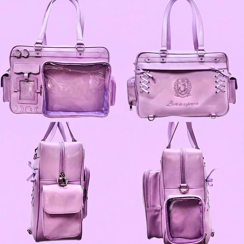 May include: A lilac handbag with multiple compartments, including a clear front pocket. The bag features top handles, decorative stitching, and side pockets. The bag has the text "Love is supreme" on the front.
