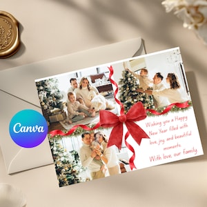 May include: A holiday greeting card with family photos, a red ribbon, and a bow. The card includes the text "Wishing you a Happy New Year filled with love, joy and beautiful moments. With love, our family."
