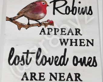 ROBINS appear when lost loved ones are near wood wall hanging