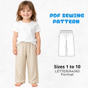 Könnte beinhalten: Ein Kind trägt ein weißes T-Shirt und eine beige Hose. Das Bild enthält eine Strichzeichnung der Hose und den Text „PDF Sewing Pattern“ und „Größen 1 bis 10“.