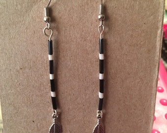 Black and white  stripe silver  feather charm earrings.