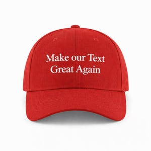 May include: A red baseball cap with a curved brim. The cap features the white text "Make our Text Great Again" across the front. The cap is a solid red color.