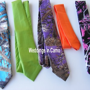 May include: Six different neckties with various camouflage patterns. The ties are in shades of blue, green, purple, orange, pink, and black. The text "Weddings in Camo" is visible in the centre of the image.
