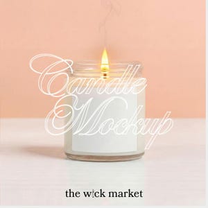 May include: A lit candle in a clear glass jar with a white label. The candle has a burning flame and a wisp of smoke rising. The words "Candle Mockup" are written in a script font. The text "the wick market" is at the bottom.