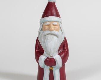 Estatua de Papá Noel de hormigón pintada a mano, decoración rústica navideña de arte popular.