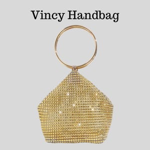 May include: A gold-colored handbag with a geometric shape and a circular handle. The bag is covered in small, sparkling embellishments. The text "Vincy Handbag" is at the top.