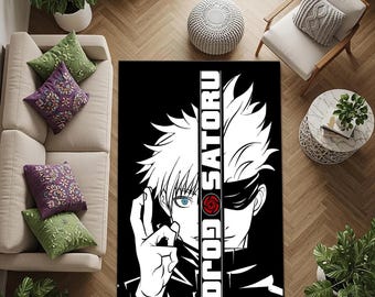 May include: Black and white area rug featuring a split design with a character's face and the text "GOJO SATORU". The character has white hair, a black eye mask, and a blue eye. A red circular design is also present.