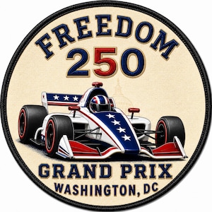 May include: A circular patch featuring a race car with red, white, and blue patriotic colors and star accents. The text reads FREEDOM 250 at the top and GRAND PRIX WASHINGTON, DC at the bottom. The design includes a black border and a cream background.