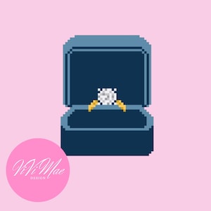 May include: Pixelated illustration of a diamond ring in a blue velvet box, set against a pink background. The ring features a large, square-cut diamond on a gold band. The box is open, showcasing the ring.