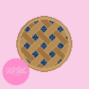 May include: A pixel art illustration of a round fruit pie featuring a golden brown lattice crust with visible dark blue berry filling in the gaps. The design is set against a solid light pink background with a circular logo reading ViVi Mae DESIGN.