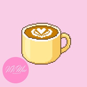 May include: Pixelated illustration of a yellow coffee mug with a brown coffee design and a heart-shaped latte art on top. The mug is set against a pink background. A pink circle with the text "ViVi Mae DESIGN" is in the lower left corner.