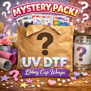 May include: A brown paper bag with a large question mark and the words "MYSTERY PACK!" and "UV DTF" in holographic lettering. The bag is filled with colorful designs, and the words "Libbey Cup Wraps" are on a purple banner.