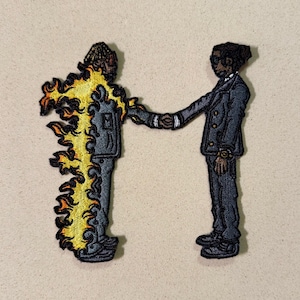 May include: A set of three ceramic mugs with a speckled, matte finish. The mugs are in shades of cream, light gray, and dark gray. Each mug has a simple, minimalist design, perfect for coffee or tea.