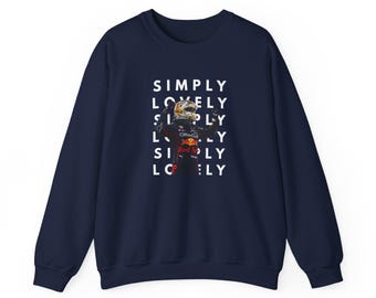 May include: Navy blue sweatshirt featuring a Formula 1 driver in a racing suit. The text "SIMPLY LOVELY" is stacked vertically in white. The Red Bull Racing logo is visible on the driver's suit.