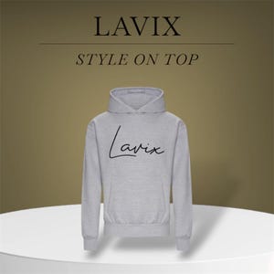 May include: A light gray hoodie with the word "LAVIX" above "STYLE ON TOP" in black text. The word "Lavix" is also written in cursive on the front of the hoodie. The hoodie is displayed on a white surface.