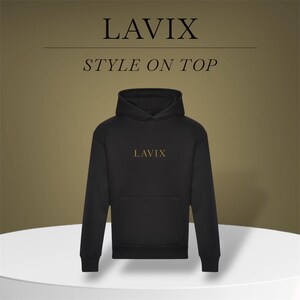 May include: Black hoodie with the word "LAVIX" in gold lettering on the chest. The hoodie has a front pocket and a hood. The text "STYLE ON TOP" is above the hoodie. The background is a gradient of gold and brown.