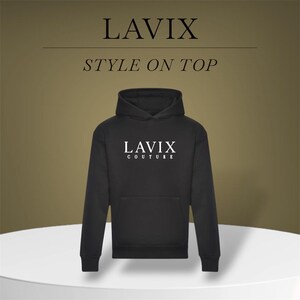 May include: Black hoodie with the white text "LAVIX COUTURE" on the front. The image also includes the text "LAVIX" and "STYLE ON TOP" in a serif font. The hoodie has a front pocket and a hood.