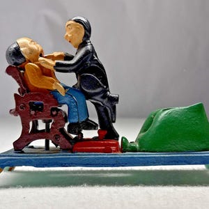 Vintage Cast Iron Dentist Pulling Tooth Mechanical Coin Bank Taiwan Reproduction