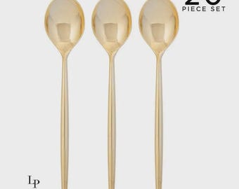 May include: Three gold-colored spoons with long, slender handles are displayed against a light background. The spoons have a reflective surface. The text "20 PIECE SET" is in the upper right corner. The Luxe Party NYC logo is at the bottom.