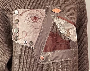 Upcycled streetwear collage sweater,Eye of God narrative  clothing, smashed penny brooch, taupe heather wool, generous size L, wearable art
