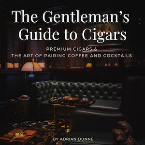 May include: A book cover with the title "The Gentleman's Guide to Cigars" in white text. Below the title are the words "PREMIUM CIGARS & THE ART OF PAIRING COFFEE AND COCKTAILS". The author's name, "BY ADRIAN DUNNE", is at the bottom. The background shows a dimly lit room with a green leather couch.