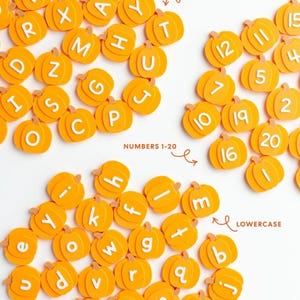 May include: A collection of orange pumpkin-shaped cutouts featuring white uppercase letters, lowercase letters, and numbers 1-20. The image includes text labels indicating UPPERCASE, NUMBERS 1-20, and LOWERCASE to categorize the pumpkin pieces.