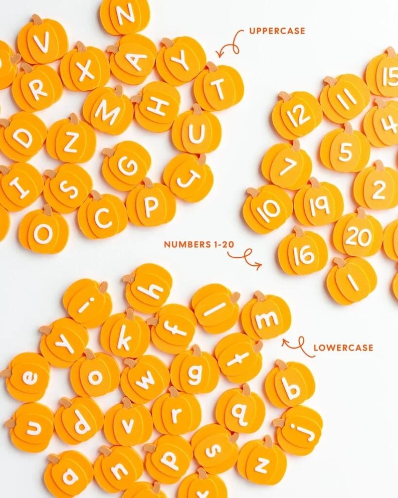May include: A collection of orange pumpkin-shaped cutouts featuring white uppercase letters, lowercase letters, and numbers 1-20. The image includes text labels indicating UPPERCASE, NUMBERS 1-20, and LOWERCASE to categorize the pumpkin pieces.