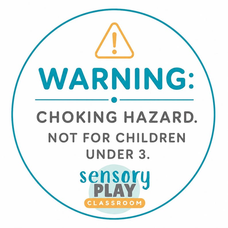 May include: A circular sticker with a teal border featuring a yellow warning triangle icon. The text reads: WARNING: CHOKING HAZARD. NOT FOR CHILDREN UNDER 3. Below this, the logo reads: sensory PLAY CLASSROOM in teal, gray, and orange text.