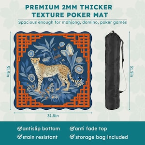 May include: A blue poker mat with a cheetah design, measuring 31.5 inches square, includes a black storage bag. The mat features an orange border and floral accents, with text that reads "PREMIUM 2MM THICKER TEXTURE POKER MAT". It is stain resistant and has an anti-slip bottom.
