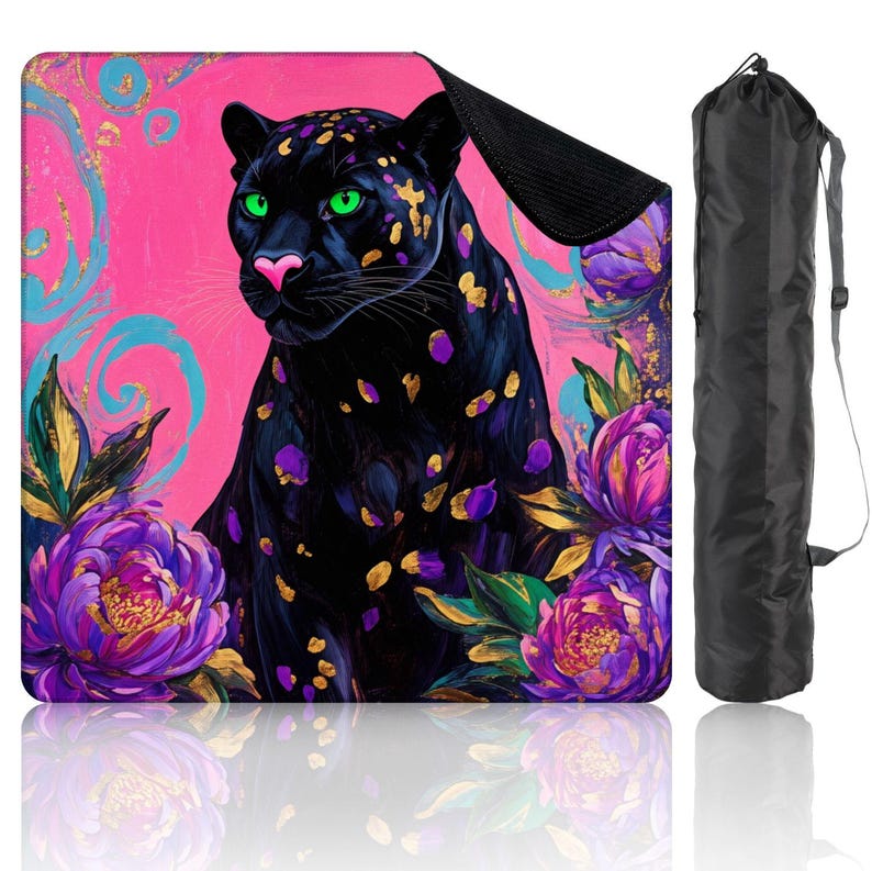 May include: Yoga mat with a black panther design, featuring green eyes, purple spots, and gold details, set against a pink backdrop with floral motifs. Includes a black carry bag.