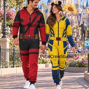 May include: A red and black hooded jumpsuit featuring a Deadpool-inspired utility belt graphic and a yellow and blue hooded jumpsuit with a Wolverine-inspired muscle suit graphic. Both garments are long-sleeved with front zippers and ribbed cuffs.