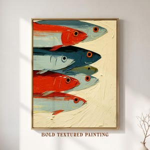 May include: A framed oil painting featuring a school of fish rendered with thick, visible brushstrokes. The composition includes several fish in shades of vibrant red, muted blue, and pale grey, all set against a textured, cream-colored background.