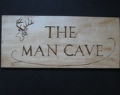 Signe de bois sculpté à la main de la grotte de l'homme pour papa