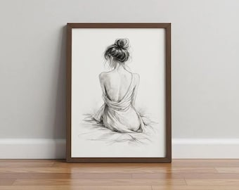 May include: A framed charcoal sketch on white paper depicting a person from the back, seated with their hair styled in a high bun. The figure wears a draped garment that leaves the shoulders and upper back exposed, rendered with soft pencil strokes.