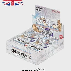 May include: A white cardboard box of One Piece card game packs. The box has the text "ONE PIECE CARD GAME" and "Sample Nami Piece TCG". The box art features a character illustration. The box is labeled "OP-05".