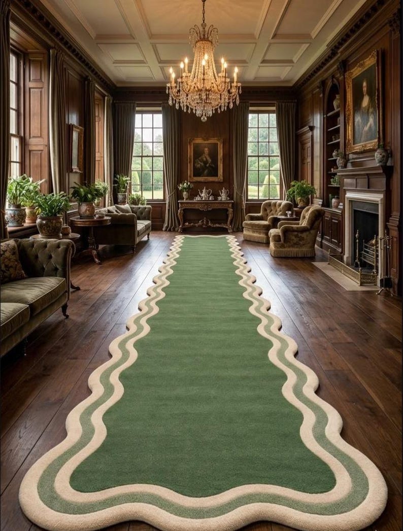 May include: A long, green rug with a wavy, cream-colored border is the focal point of a room with dark wood paneling and a chandelier. The rug's design adds a unique touch to the classic interior. The room also features large windows and antique furniture.