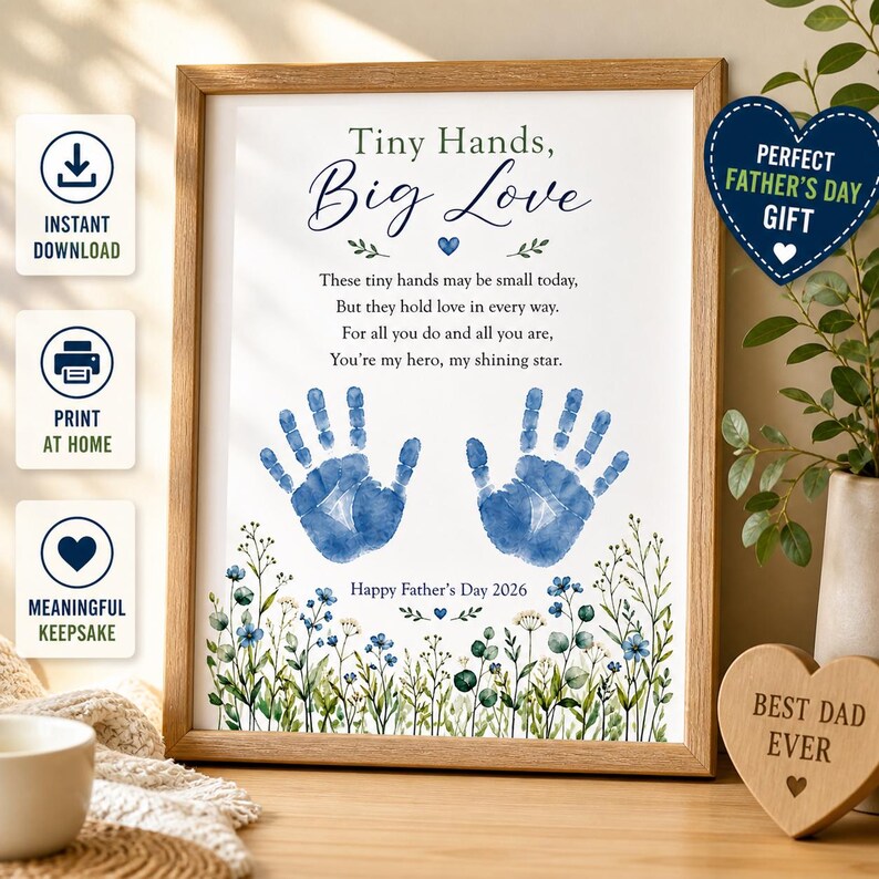 May include: A framed print with the text "Tiny Hands, Big Love" and blue handprints. The print includes the text "Happy Father's Day 2026". A heart-shaped wooden plaque reads "Best Dad Ever".